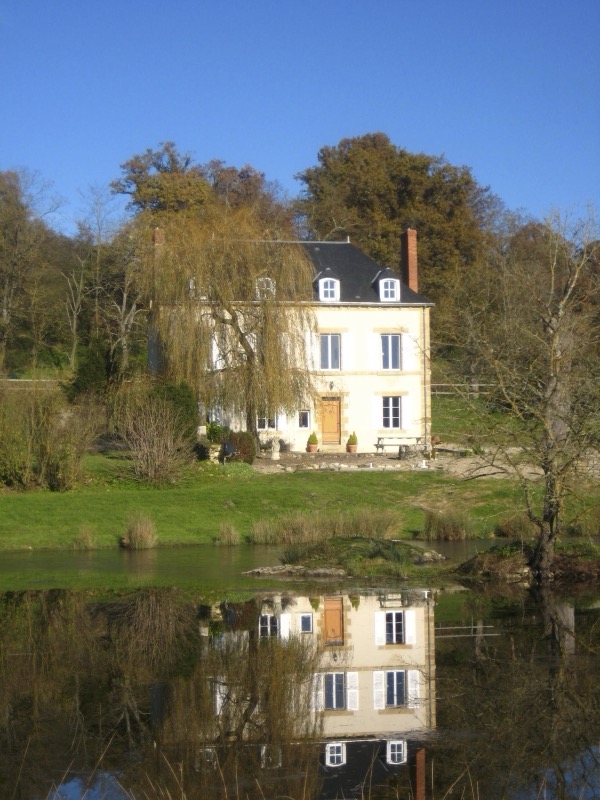 The house reflected on the lake
