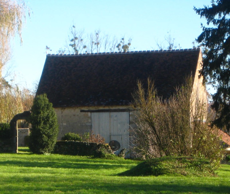 The closed barn seen from the main garden